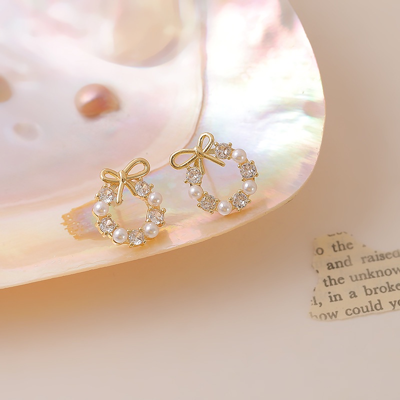 S925 Korea busur Mutiara wanita kecil dan sederhana rasa desain anting-anting anting-anting anting-a