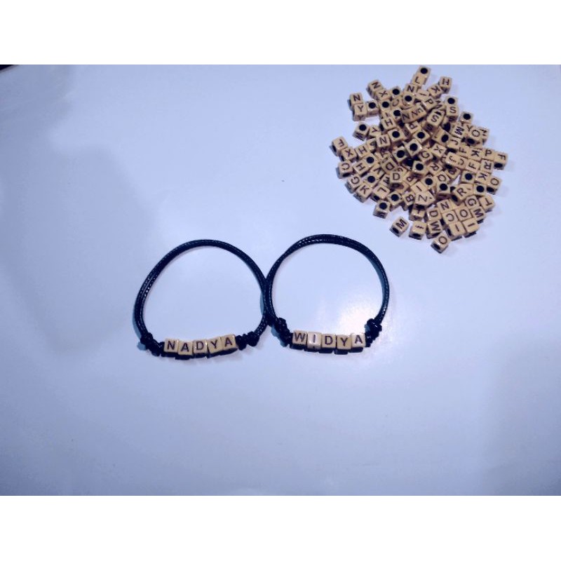 Gelang nama mote dadu coklat