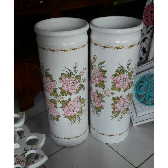 

Tempat payung cat putih dan lukis