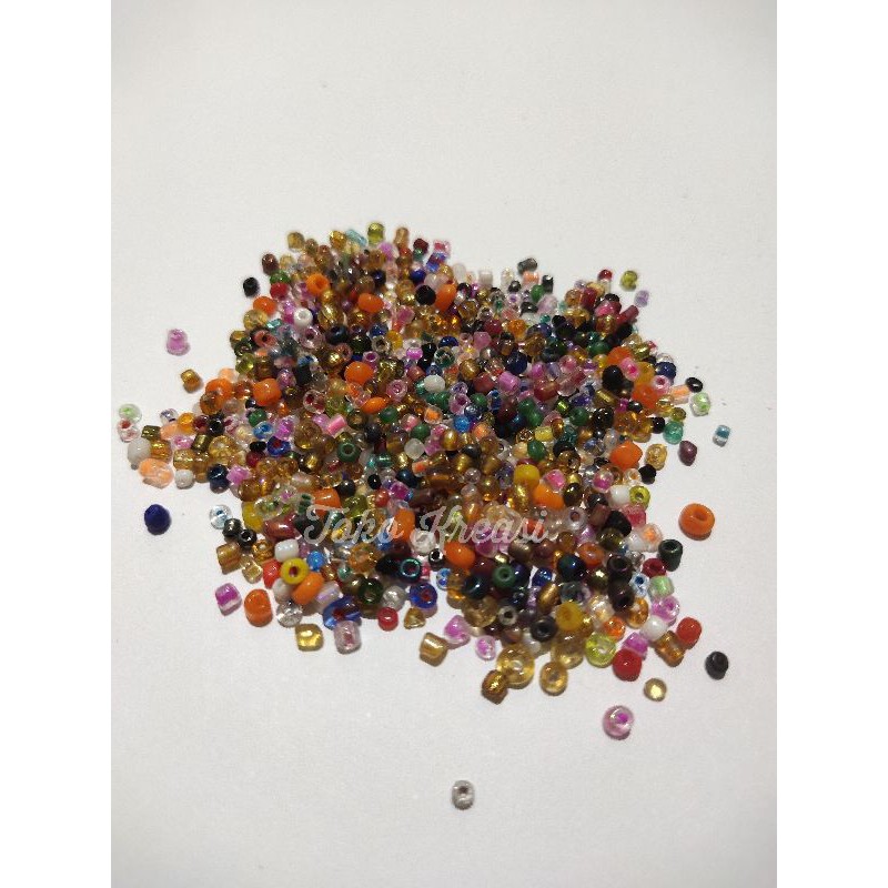 (Per Bungkus) Mote / Manik pasir ukuran 11/0 (2mm)  warna random