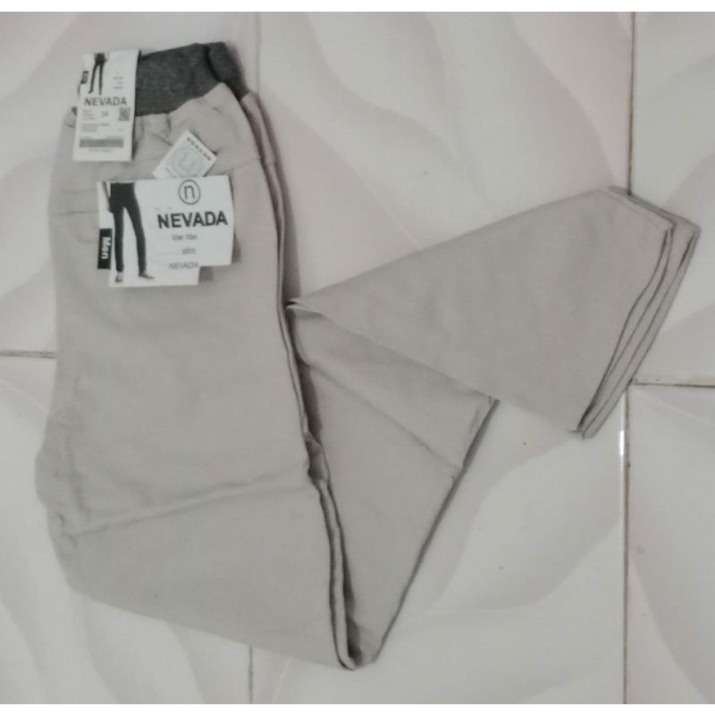 Celana Panjang Pria Chinos Rip Pinggang Karet Slim Melar Katun Premium Qualitiy  NVD Dengan harga Ekonomis