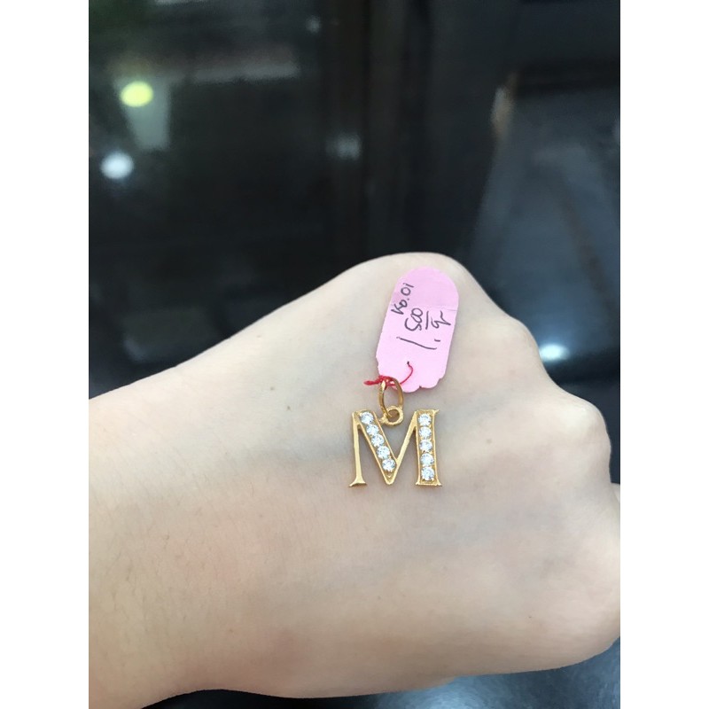 Liontin M emas asli kadar 700