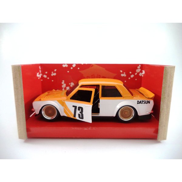 DIecast Jada JDM-Tuners Datsun 510 Widebody 1973 Orange - Skala 1:32