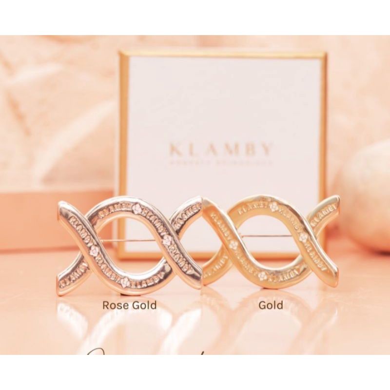 MONOGRAM BROOCH WEARING KLAMBY ROSE GOLD