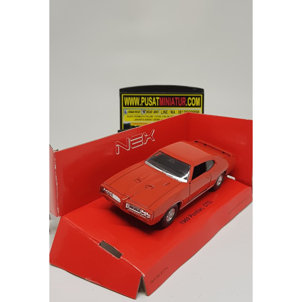 1969 PONTIAC GTO (ORANGE) - SKALA 36 - WELLY (DIECAST-MINIATUR)