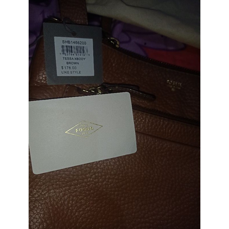 tas fossil  authentic likenew