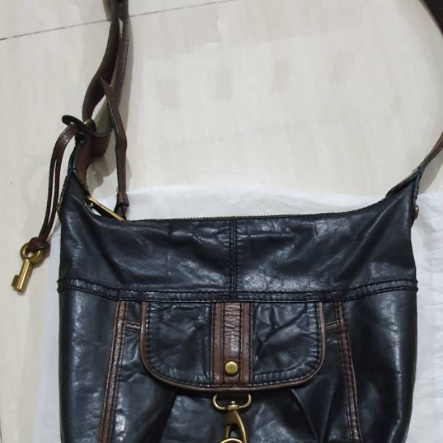 Tas fossil slempang fifty four