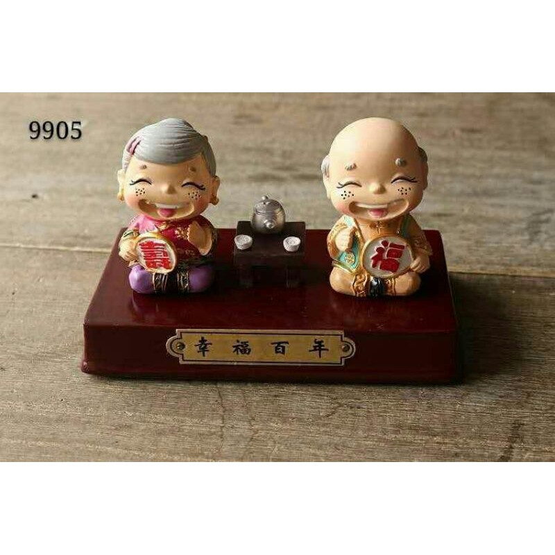 patung pajangan kakek nenek