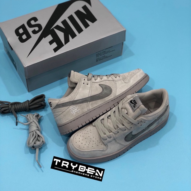 nike sb dunk low pro qs reigning champion grey