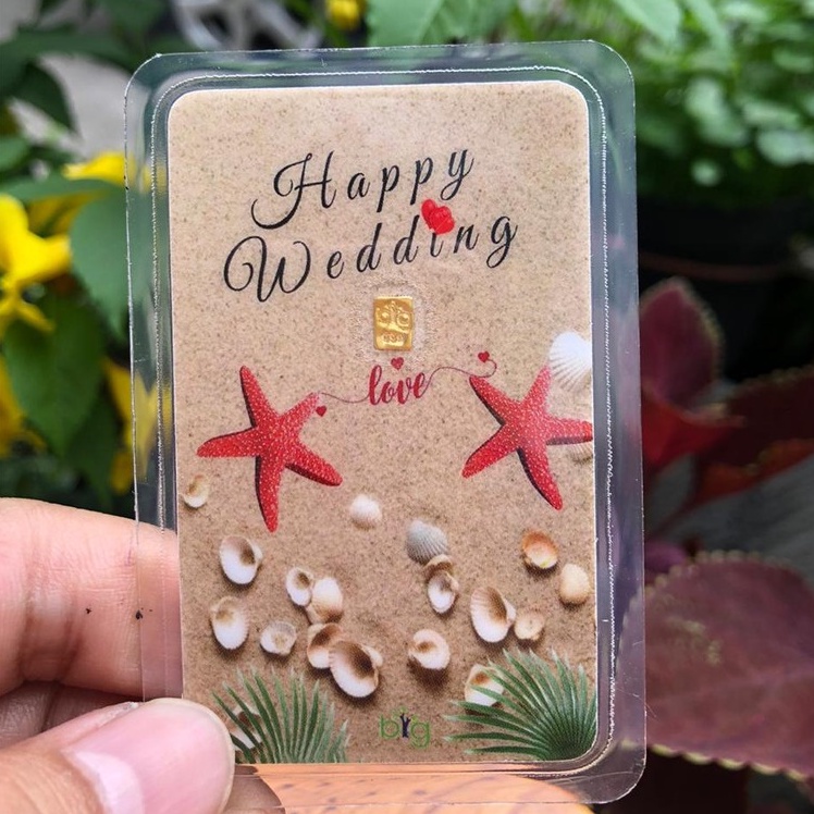 EMAS MINI 24 KARAT BIG GOLD 0,1 GRAM HAPPY WEDDING KEMASAN LAMINATING