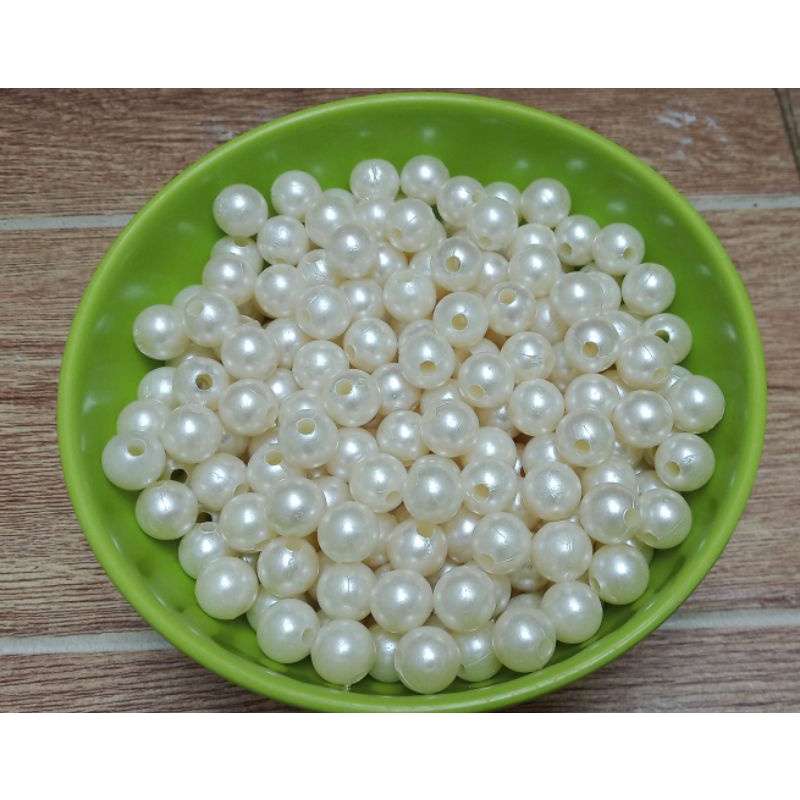 45 gr Mutiara sintetis 2 lobang size 10mm dan 14mm