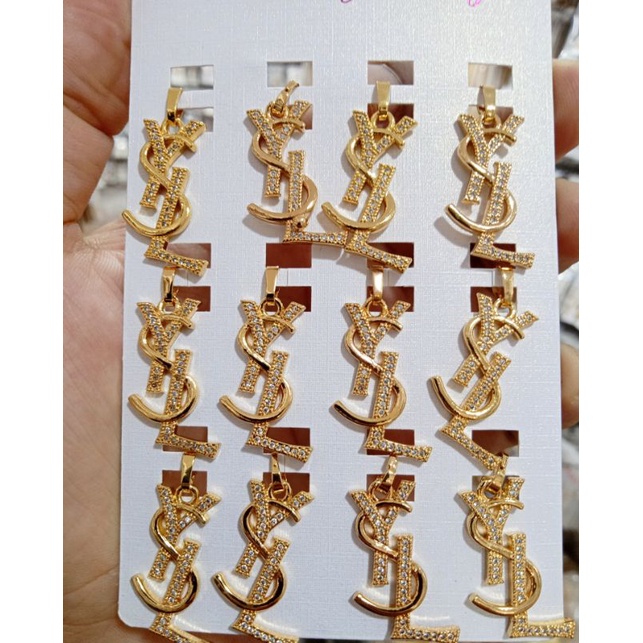Liontin xuping YSL berlapis emas dengan mata zircon.