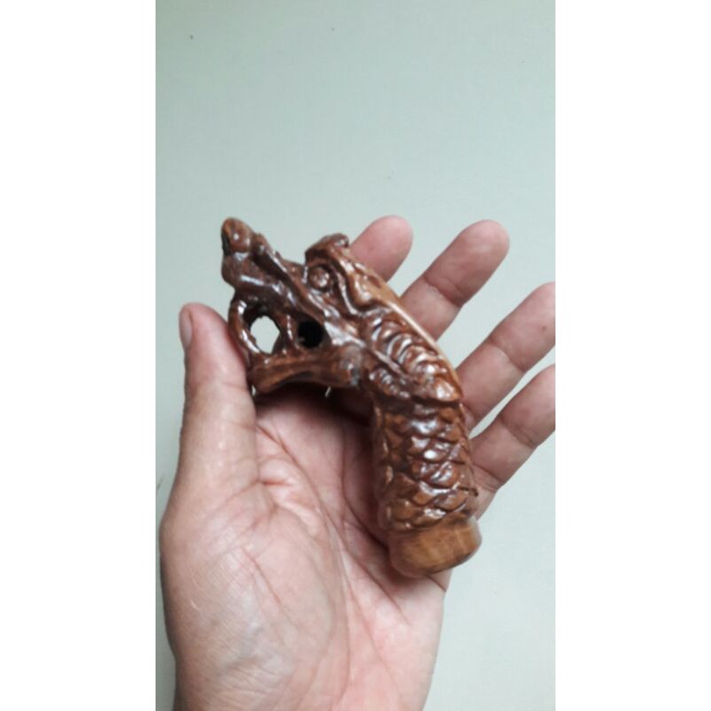 deder keris kayu stigi ukir naga mahkota