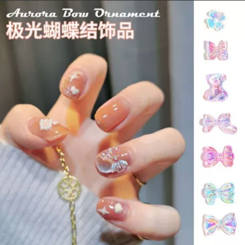 Hiasan Nail Arts bentuk pita isi 10pcs