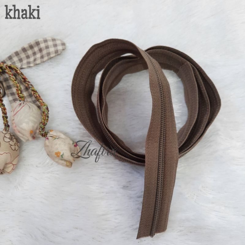 resleting, resleting tas,  daun resleting, merk Amco, kepala resleting terpisah