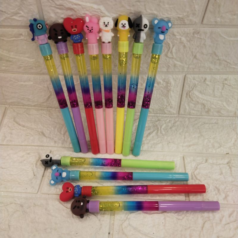 

PULPEN GEL GLITTER MOTIF KARAKTER KPOP BTS BT21, DORAEMON, UNICORN, EMOJI , LUCU IMUT