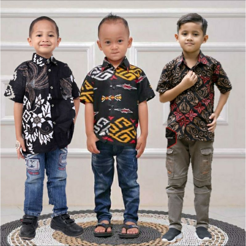 HEM BATIK ANAK BAJU ANAK USIA BALITA SATU TAHUN 1 2 3 4 5 6 7 8 9 10 11 12 13 14TAHUN REMAJA KEMEJA LENGAN PENDEK BATIK MOTIF MEGA MENDUNG HITAM SONGKET MERAH ZIGZAG SONGKET BALI ADABI ABU BOROBUDUR SOGAN BOROBUDUR HITAM PUTIH MODERN MURAH