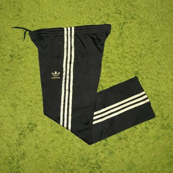 Celana training trackpant adidas firebird stripe gold