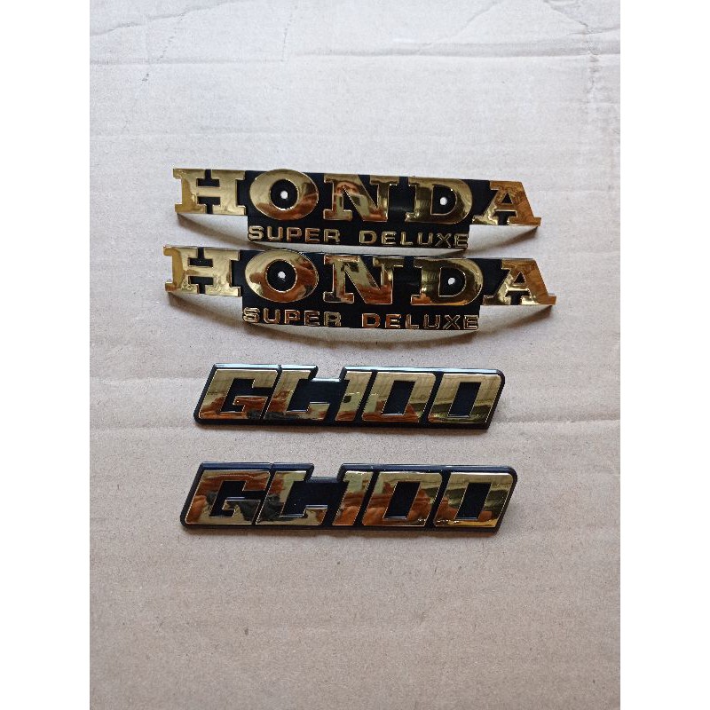 emblem tangki set bok aki gl 100 mirip ori