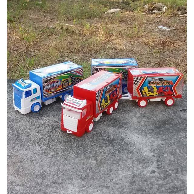 

Truk box gandeng St 2022