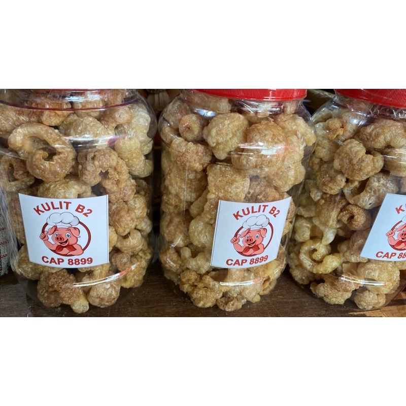 

kerupuk kulit Babi toples /ciu ju ca /kerupuk kulit / kerupuk renyah / kulit babi / kulit babi renyahkerupuk B2 / kerupuk Babi / kerupuk / non halal /pork skin crackers