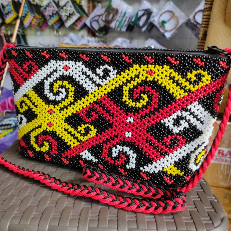 Tas tiung selempang motif dayak kalimantan