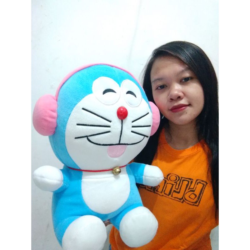 Boneka Doraemon Terbaru Lucu dan Imut pake Headshet Pink