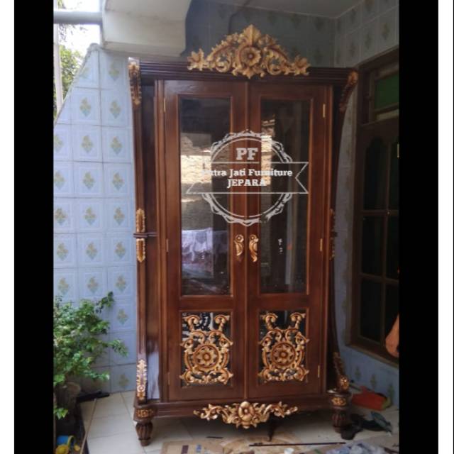 Lemari pajangan ukir Jepara - Rak bufet hias ruang tamu kayu jati