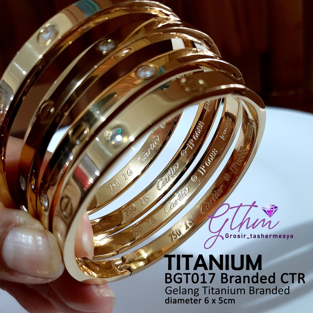 Gelang titanium cap 750 permata bgt077