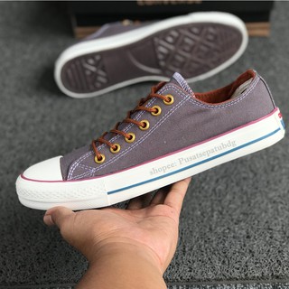 tan low top converse