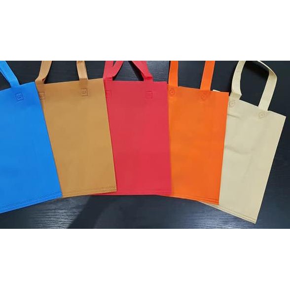 

Tas Handle Tali 30 x 40 / isi 12 pc / Spunbond Kain Lipat Samping uk M