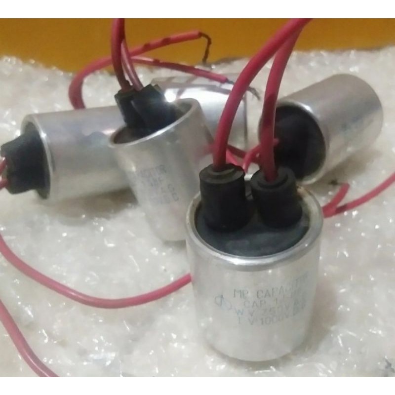 elko CAP.capacitor : 1,5UF - W. V : 350V. AC - T. V : 1000V. DC