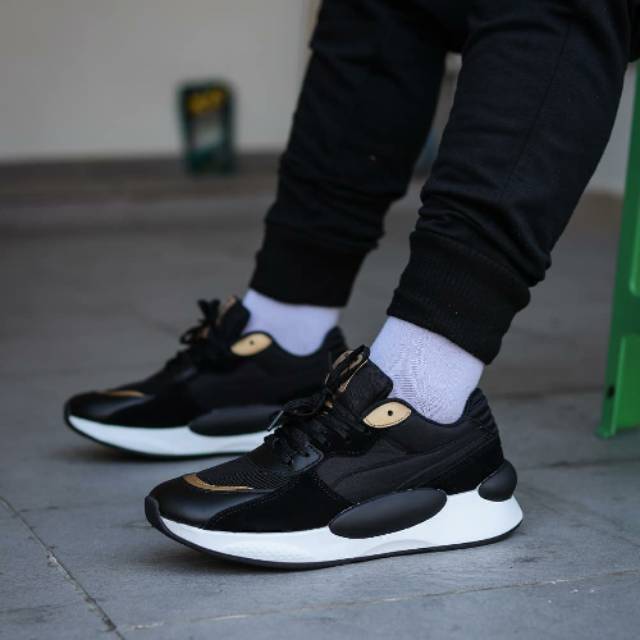 Puma rs 9.8 black gold