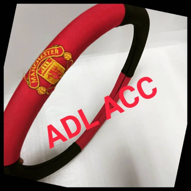 pelindung cover sarung PENGAMAN  stir setir mobil karet motif bola manchester United