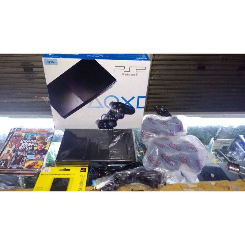 PS2 slim Sony seri 9  pakai kaset+2 stik getar ps2+5 kaset+ memory card 8mb