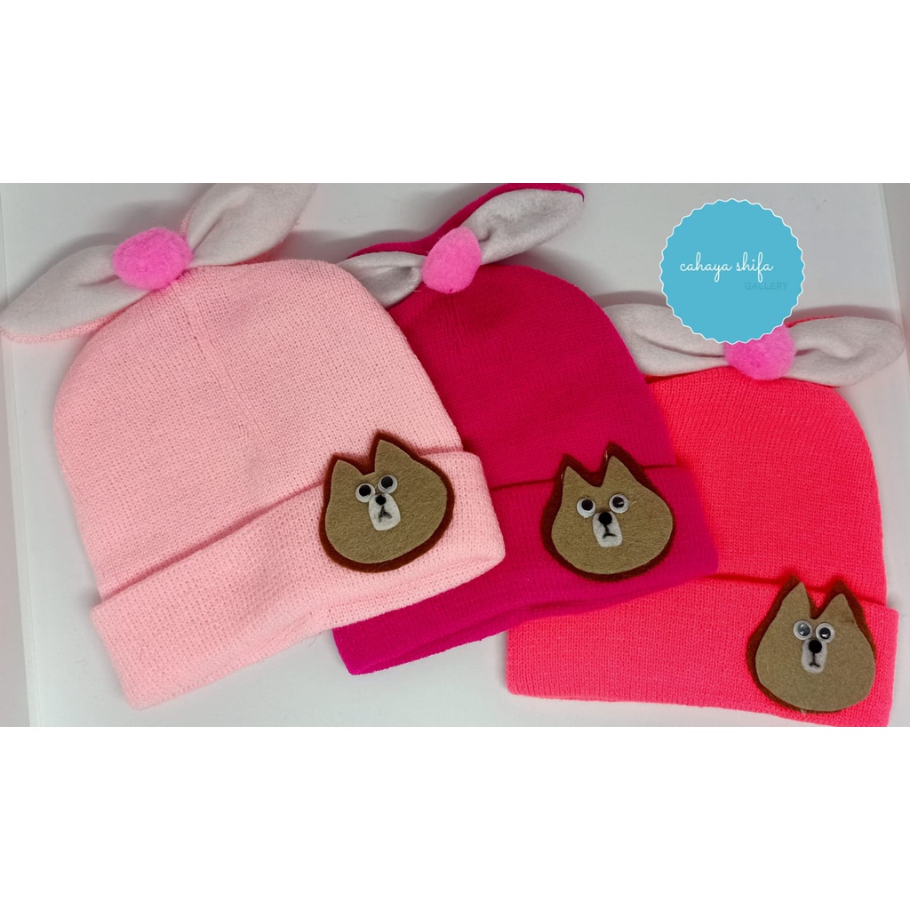 kupluk anak bayi pita lucu / kupluk anak cewe motif pita / kupluk topi bayi cewe motif pita
