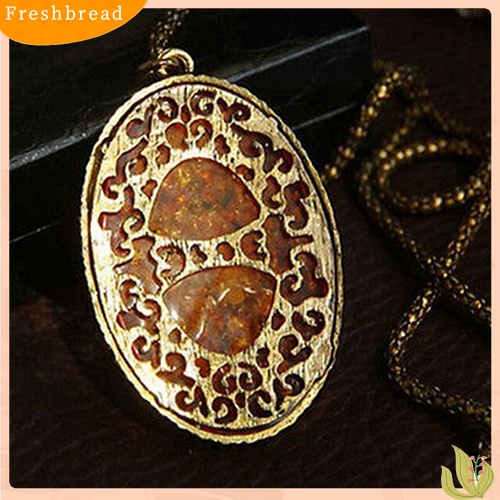 [TERLARIS]Women's Vintage Amber Tone Hollow Long Chain Drop Pendant Sweater Necklace