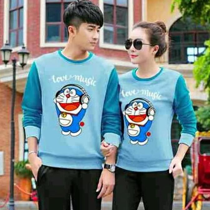 promo couple sweater doraemon - biru muda terbaru