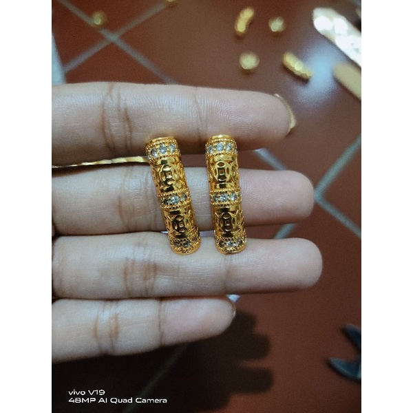 liontin gelang tangan