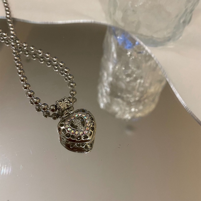 Kalung Rantai Desain Hati Hollow Aksen Berlian Gaya Retro Korea Untuk Wanita