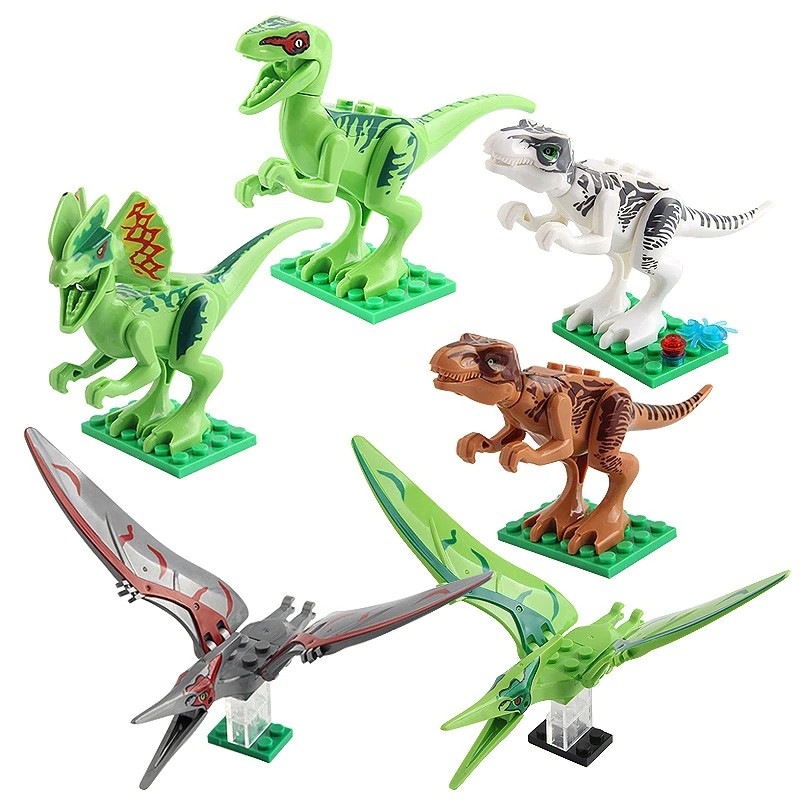dinosaur assembling building blocks