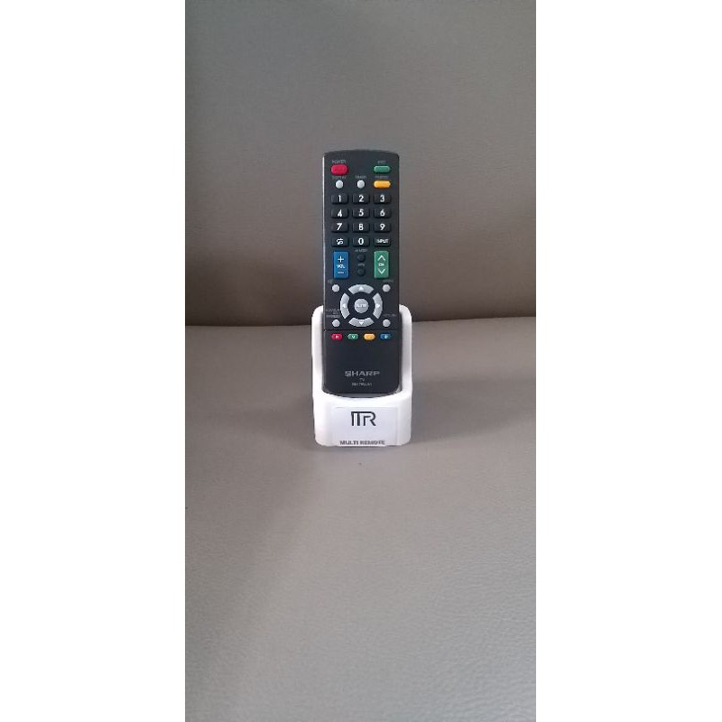 TEMPAT/DUDUKAN/TATAKAN REMOTE TV