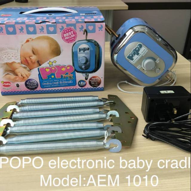 Mesin ayunan bayi elektrik