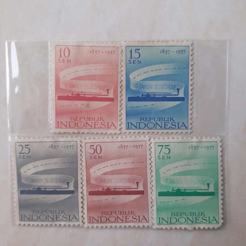 

(A) Perangko Indonesia 100th Telegram Tahun 1957 set lengkap - 5pcs