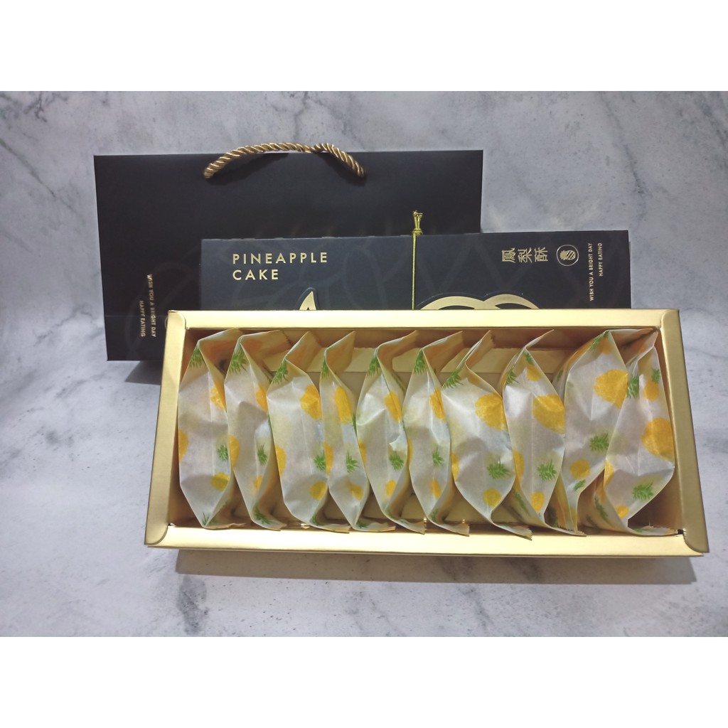 

Hampers Nastar Nanas Taiwan Premium / PREMIUM PINEAPPLE CAKE isi 10