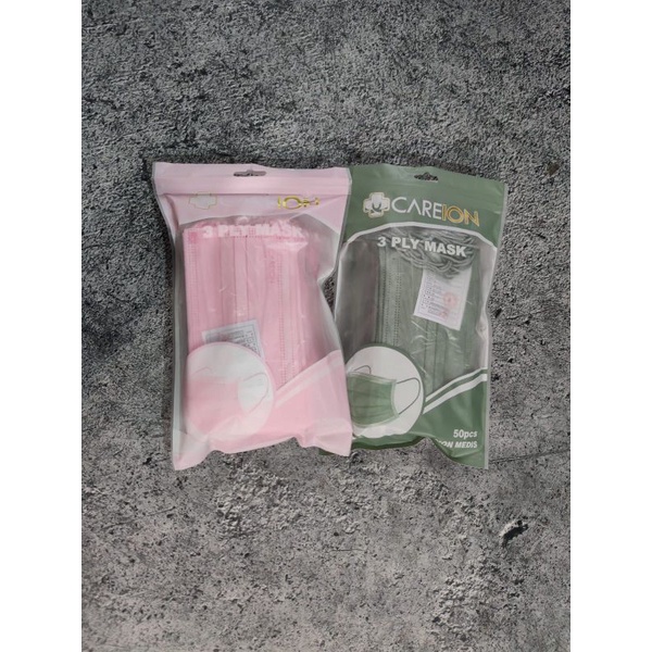 READY MASKER CAREION CARE ION EARLOOP 3 PLY YA YG INI WARNA MATCHA DAN PINK