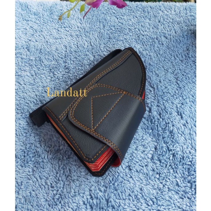 Dompet Taji Segitiga