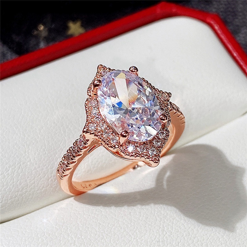 Cincin Wanita Warna Rose Gold Hias Cubic Zirconia Bentuk Oval Gaya Romantis Untuk Pertunangan / Pernikahan