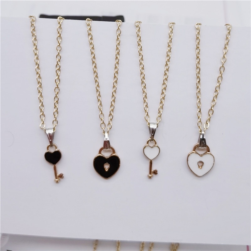 2pcs / Set Kalung Liontin Kunci Hati Untuk Pria Dan Wanita
