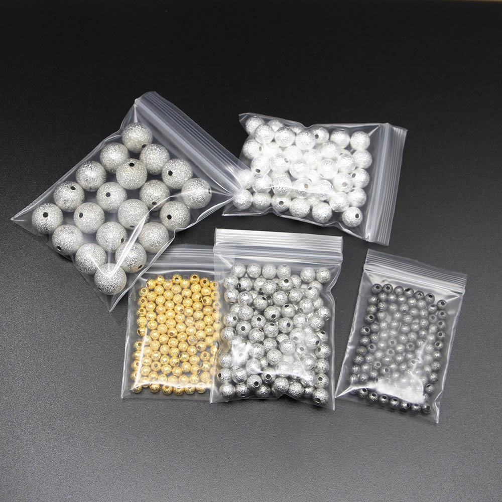 100pcs / Lot 4 6 8 10 12mm Manik-Manik Bulat Bahan Tembaga Warna Silver Gold Untuk Membuat Perhiasan